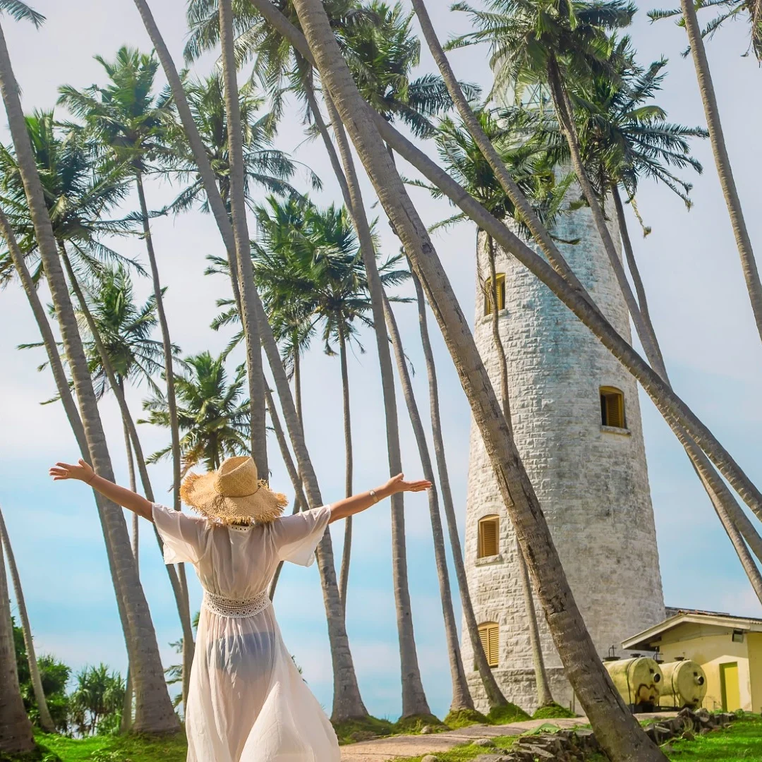 girl-in-sri-lanka-on-an-island-with-a-lighthouse-2024-12-19-12-43-42-utc